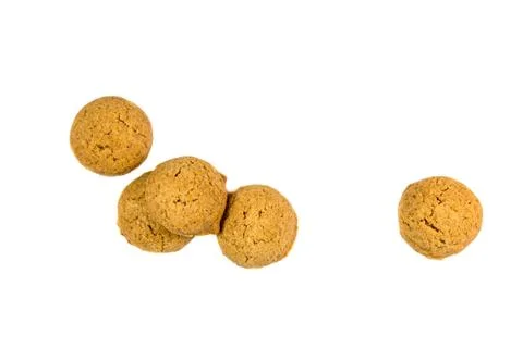 Five scattered ginger nuts from above Stock Photos