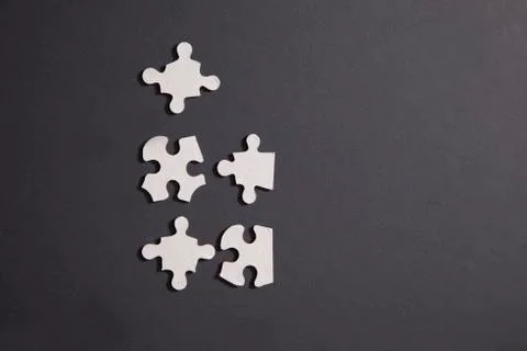 Five scattered puzzle pieces Foto stock