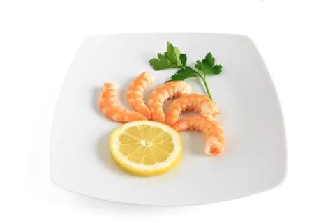 Five shrimps with lemon Stock Photos