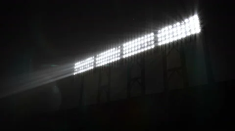 Five sizes of Stadium floodlights flashing and turning on and off. White. 5 in 1 Stock Footage