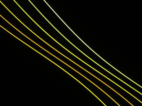 Five slender yellow and lime lines run diagonally across a black background.. Stock Illustration