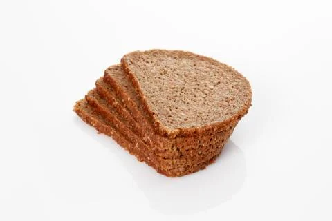 Five slices of whole-grain bread, stacked Stock Photos