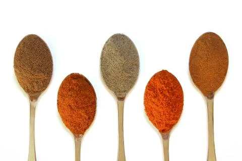 Five spoons with various spices Foto stock