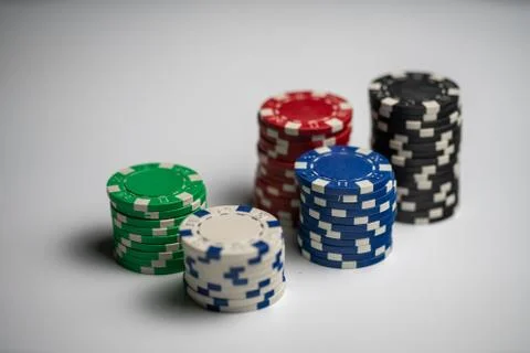 Five stacked poker chips in different colors Stock Photos