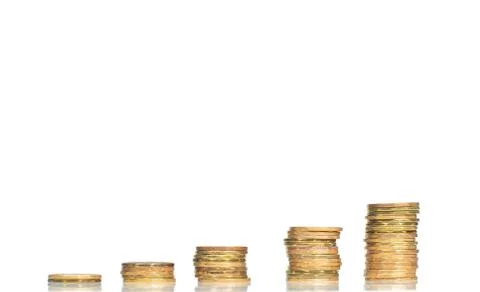 Five stacks of coins forming steps up isolated on white background Stock Photos