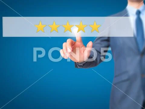 Five star rating - Businessman hand pressing button on touch scr Stock Photos
