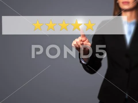 Five star rating - Businesswoman hand pressing button on touch s Stock Photos