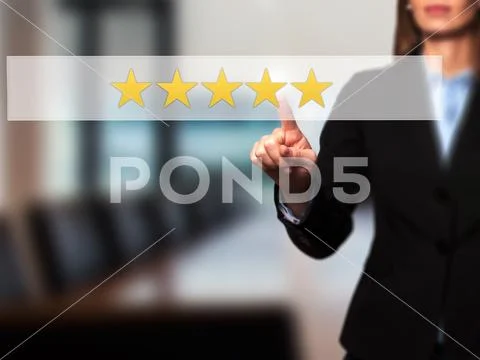 Five star rating - Businesswoman hand pressing button on touch s Stock Photos