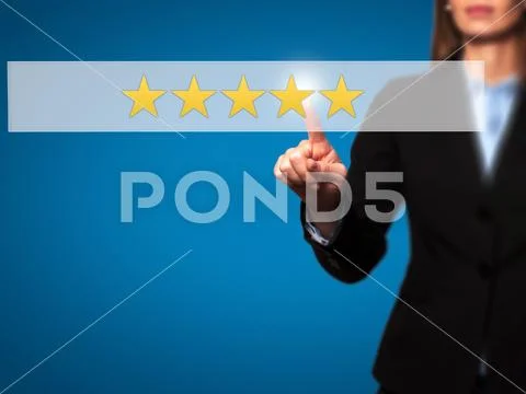 Five star rating - Businesswoman hand pressing button on touch s Stock Photos