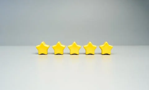 Five star rating concept with 5 yellow stars in a row on white. Customer sa.. Fotos de archivo