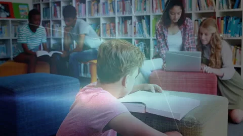 Five students flipping texts and typing on laptop in library, activating Stock Footage 312361479