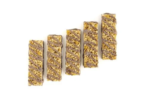 Five sweet popcorn bars vertically on a white background. Stock Photos