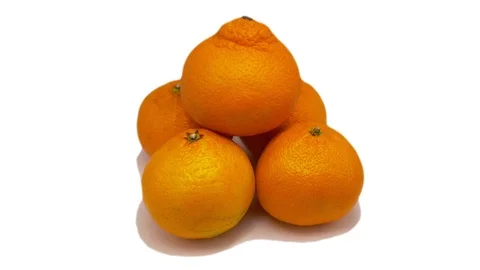 Five tangerines rotate on a white background. One mandarin lies on top of the Video stock 118964487