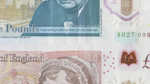 Five, Ten And Twenty Pound UK British Banknotes With Faces Of Famous Stock Footage 142241471