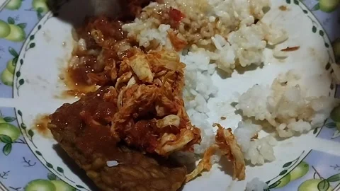 Five thousand mixed rice with super spicy tomato sauce Stock Footage 219774128