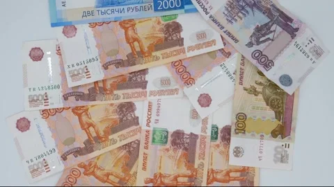 Five thousand ruble bills spinning on a white background Stock Footage 319746862