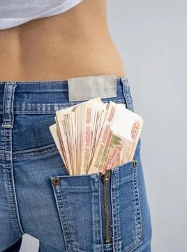 Five thousand Russian rubles banknotes in the back pocket of his jeans. The c Stock Photos