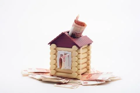 Five thousandth Russian banknotes stick out from the house, the house stands  Fotos de archivo