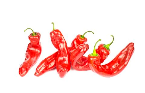 Five twisted peppers Stock Photos