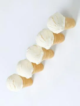Five vanilla ice cream cones in a row Stock Photos