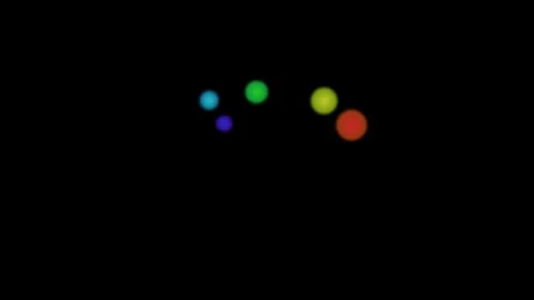Five vibrant glowing orbs arranged in a diagonal pattern on black background Video stock 335117670