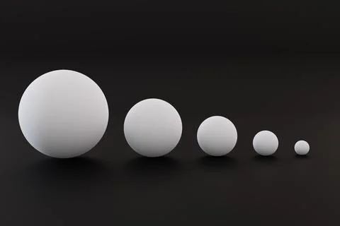 Five white balls of different sizes. balls of different sizes on a black back Illustrazione stock