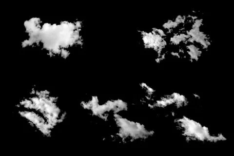 Five white natural clouds isolated on a black background. Stock Photos