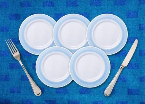 Five white plates Stock Photos