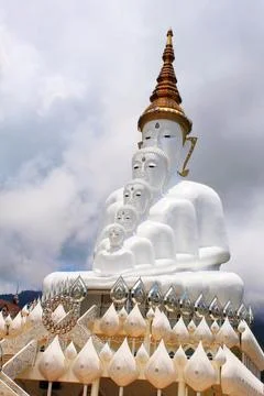 Five white sitting Buddhas are a landmark. Wat Pha Sorn Kaew, in Khao Kor, .. Stock Photos