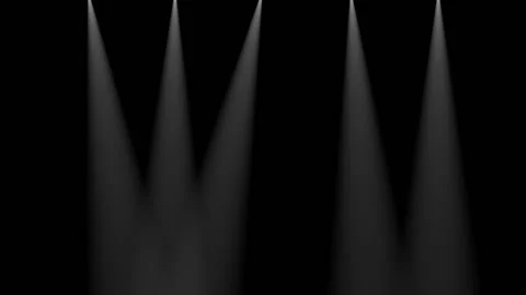 Five white spotlights shine in different directions on a black background Stock Footage 137788234