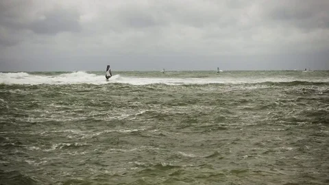 Five windsurfers in a troubled sea Stock-Footage 82174137