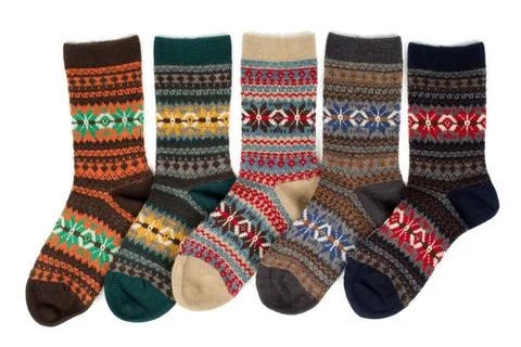 Five of wool socks with a pattern Five of wool socks with a pattern. Isola... Stock Photos