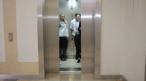 Five workers in the elevator Stock Footage 65330745