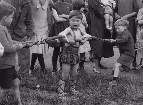 Five year old boy John Mann competing with other boys, United Kingdom, 1925 Stock Footage 172219578