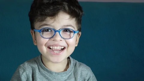 Five year old boy playing with toy soldiers Stock-Footage 82490070