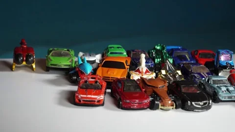 Five year old boy playing with toy cars Stock-Footage 82490217