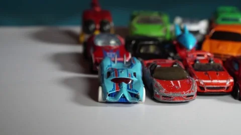 Five year old boy playing with toy cars Stock-Footage 82490230