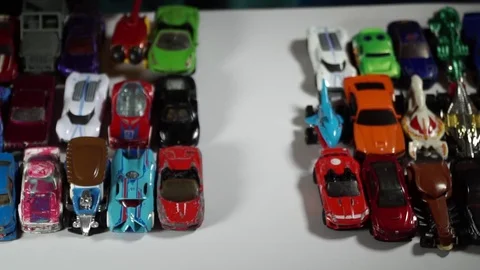 Five year old boy playing with toy cars Stock-Footage 82490253