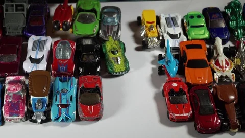 Five year old boy playing with toy cars Stock-Footage 82490309