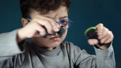 Five year old boy playing with toy cars Stock-Footage 82490409