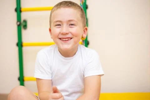 A five year old boy playing in his room Stock Photos