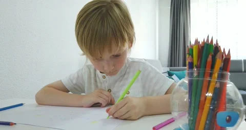 Five years old boy with tablet and drawing tools. Stock Footage 135764482