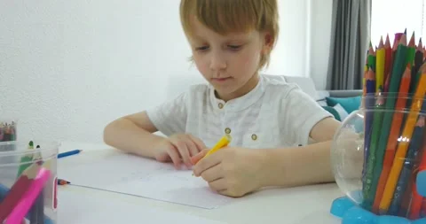 Five years old boy with tablet and drawing tools. Stock Footage 135764497