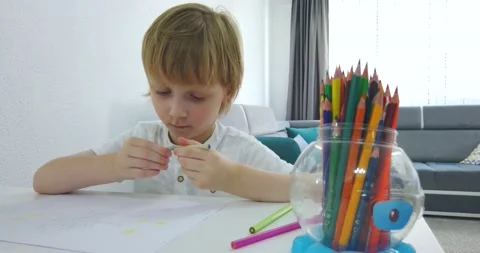 Five years old boy with tablet and drawing tools. Stock Footage 135764625