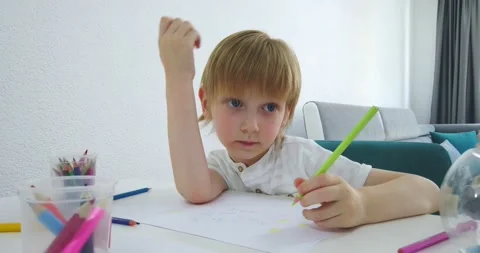 Five years old boy with tablet and drawing tools. Stock Footage 135764636