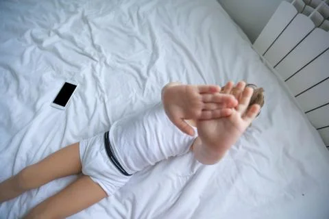 Five years old child sleeping with hat comfortably Stock Photos