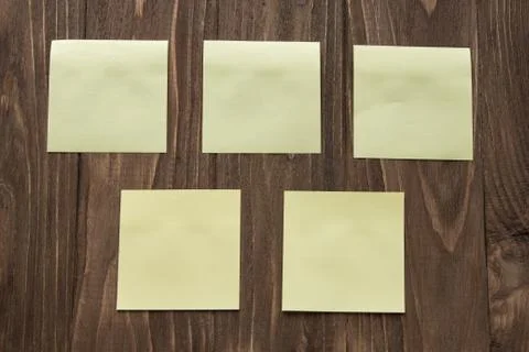 Five yellow post-in notes Stock Photos