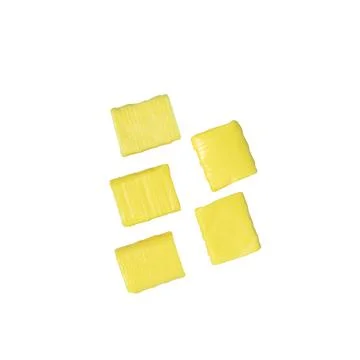Five yellow rectangular chewy candy on a white Stock Photos