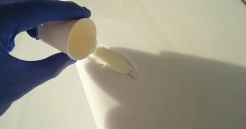 Fix ding on a epoxy surfboard. Stock Footage 229359005