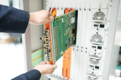 Fix network switch in data center room Stock Photos